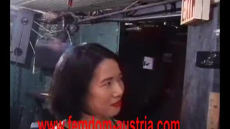 Oriental Mistresses torments slave friends in cell in same time.
